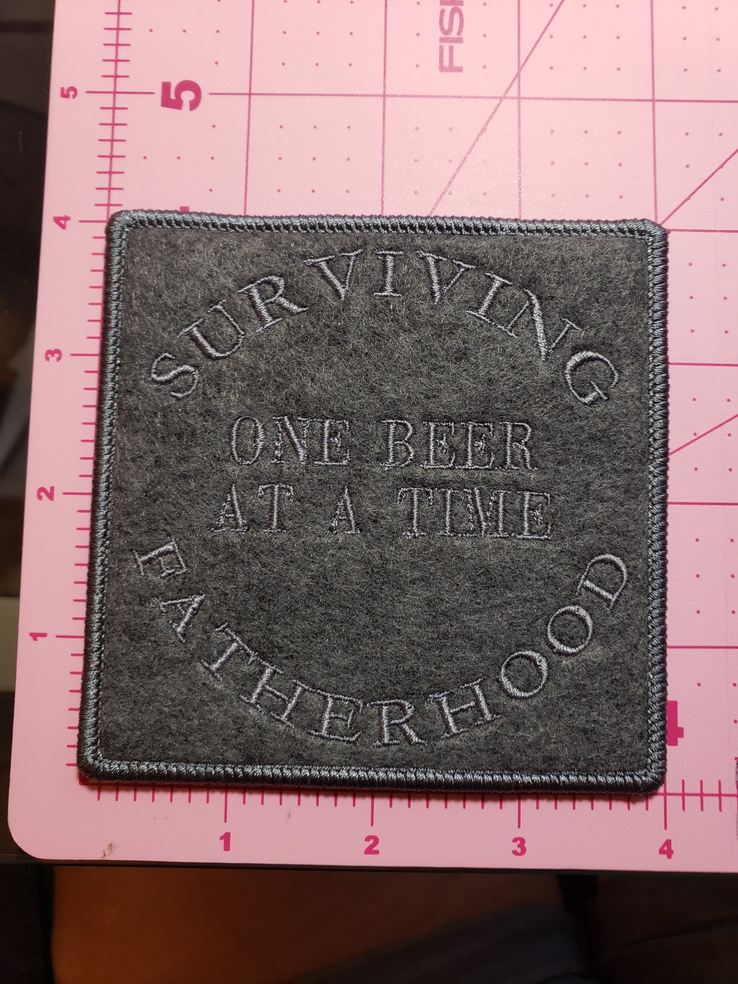 Surviving Fatherhood on Beer at a time Mug Rug on Felt